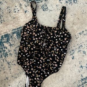 Black, lace up One Piece Bathing Suit. Size XL
